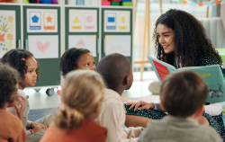 Teacher Appreciation Week Teacher reading to a class of students