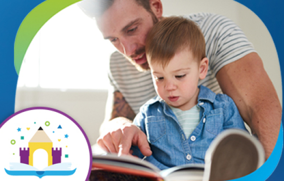 Dad reading with young child