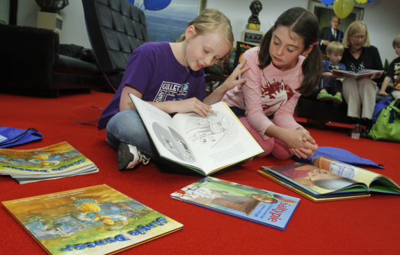 Girls reading together